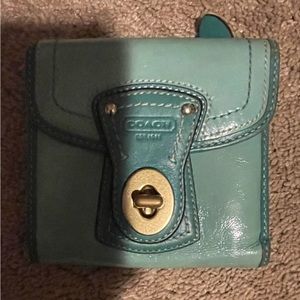 vintage coach leather wallet with brass turning preowned in great condition.